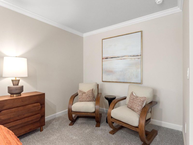 Create a reading nook or lounge space in the primary bedroom.