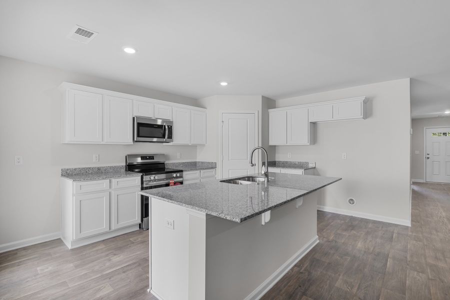 Furnished interior in a model home at Pine Street in Yemassee (Image 18).