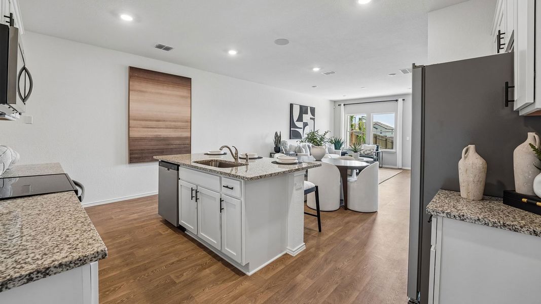 Furnished interior in a model home at Palomino in Manor (Image 22).