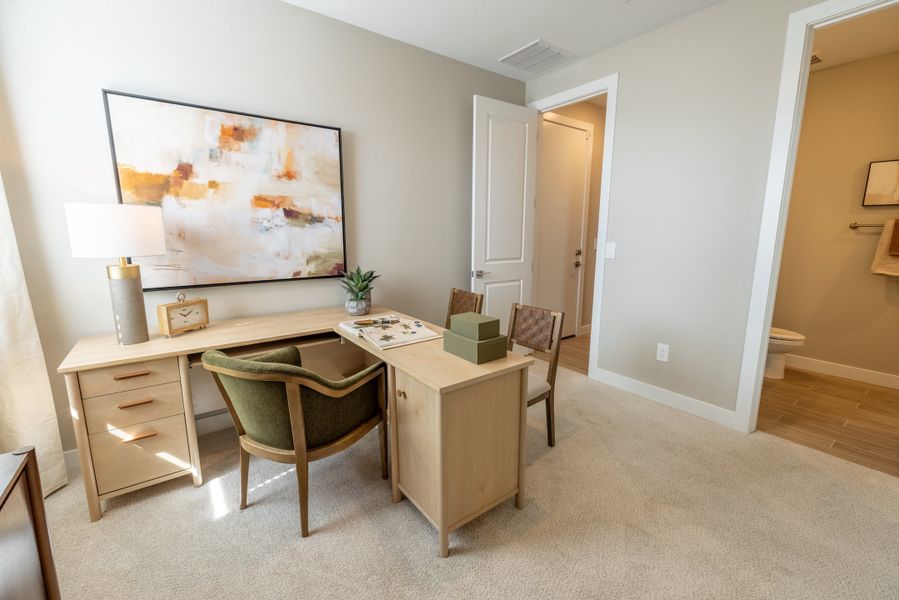 Furnished interior in a model home at Blossom Rock Reserve Series in Apache Junction (Image 27).