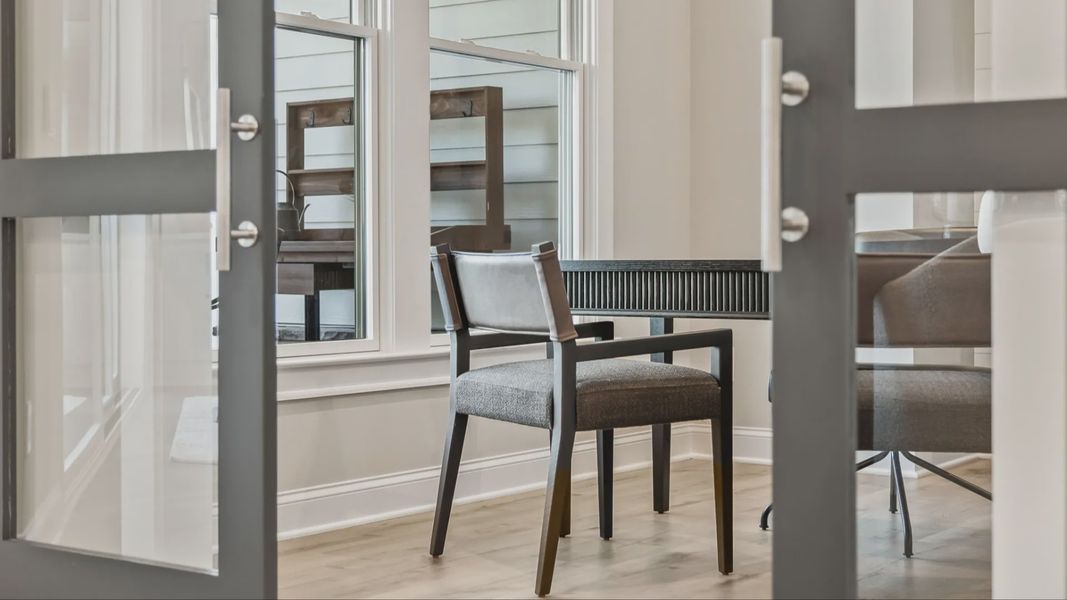 Furnished interior in a model home at The Courtyards at Post Road in Cumming (Image 10).