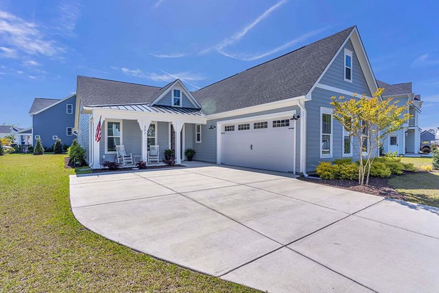 Front exterior of a home in the WyndWater community, located in Hampstead, NC (Image 20).