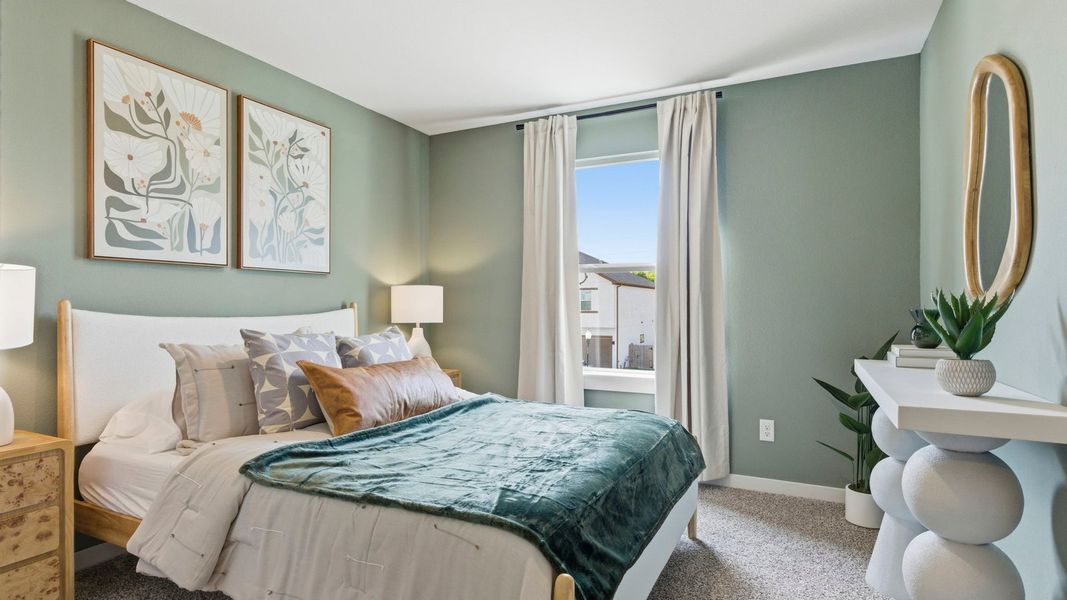 Furnished interior in a model home at Murphy Village in Missouri City (Image 25).