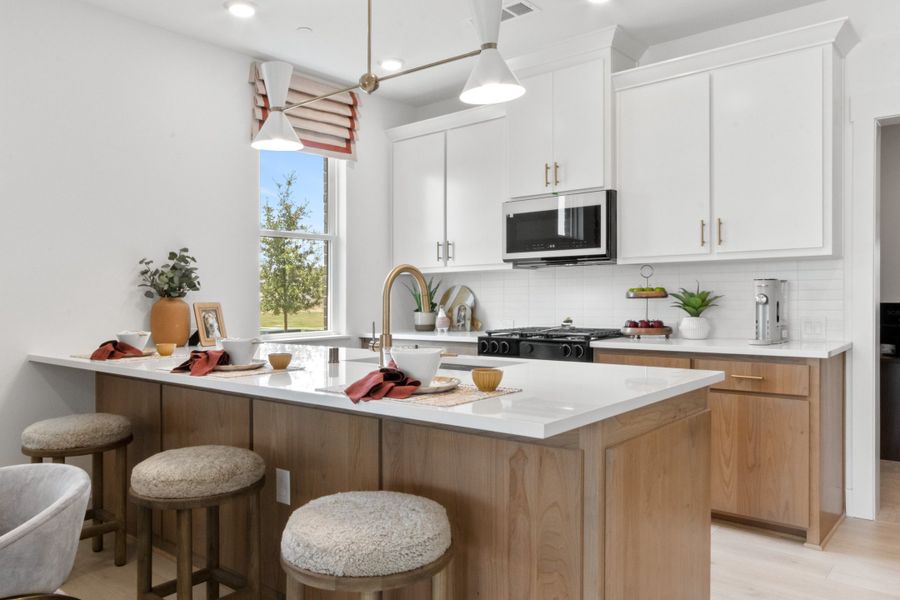 Furnished interior in a model home at Willow Grove Townhomes in Melissa (Image 18). Furnished interior in a model home at Willow Grove Townhomes in Melissa (Image 18).