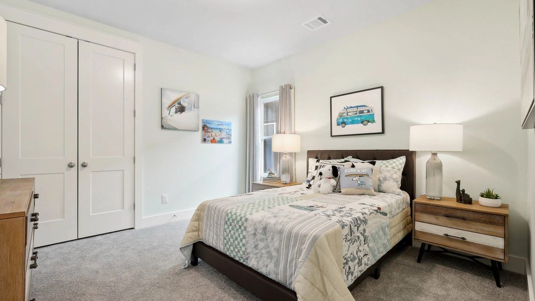 Experience refined comfort with exquisite patterned bedding and curated decor in Collin Creek's premier homes. Experience refined comfort with exquisite patterned bedding and curated decor in Collin Creek's premier homes.