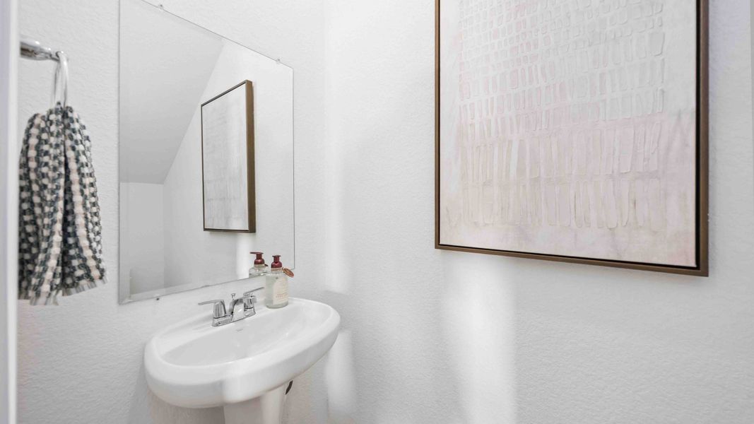 Furnished interior in a model home at Wheatley Oaks in Houston (Image 12).