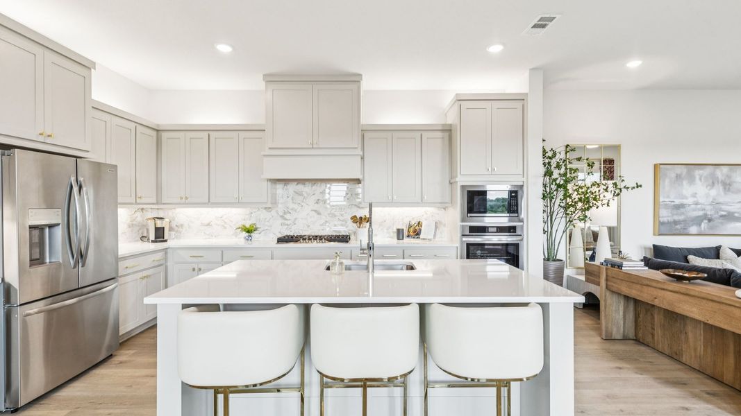 Furnished interior in a model home at The Heights at Uptown in Celina (Image 9).
