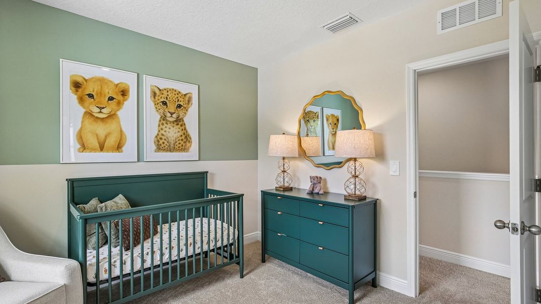 Furnished interior in a model home at Sanctuary at Citrus Park Townhomes in Tampa (Image 22).