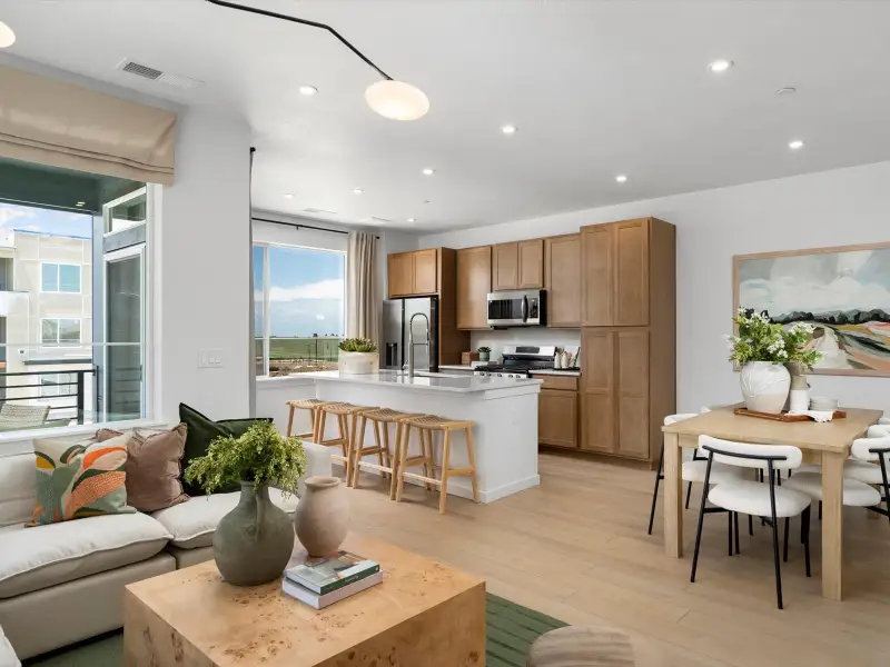 Furnished interior in a model home at Lyric at RidgeGate Townhomes in Lone Tree (Image 3).