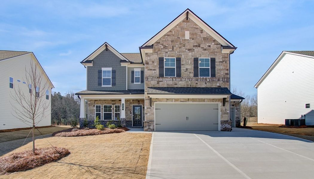 Front exterior of a home in the Pinecrest Ridge community, located in Dacula, GA (Image 10).