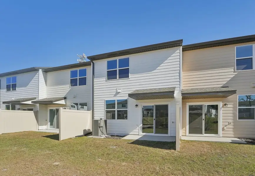 Exterior details of a home in Clinton Townhomes, Dade City (Image 3).