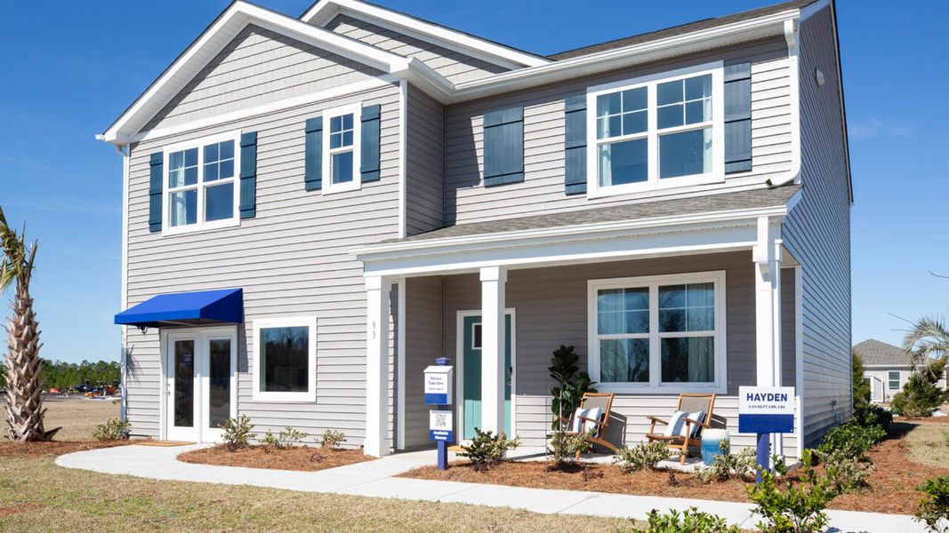 Front exterior of a home in the The Grove at Blake Farm community, located in Wilmington, NC (Image 4). Front exterior of a home in the The Grove at Blake Farm community, located in Wilmington, NC (Image 4).