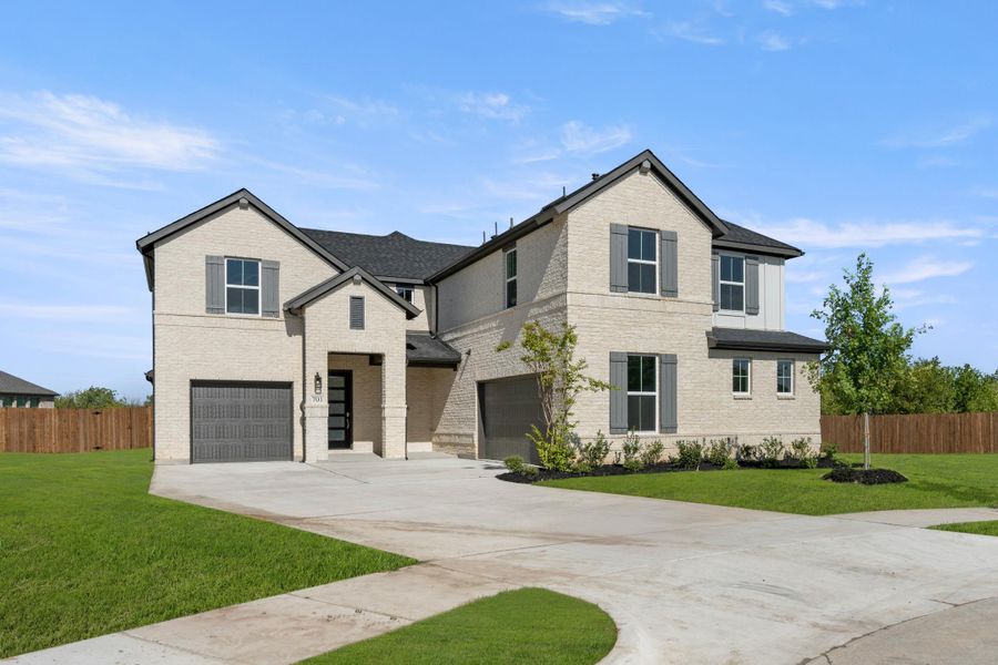 Front exterior of a home in the View at the Reserve 60s community, located in Mansfield, TX (Image 7).