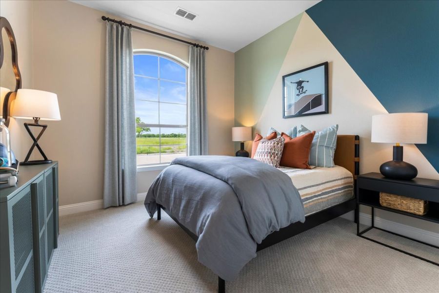 Furnished interior in a model home at River Ranch in Van Alstyne (Image 13).