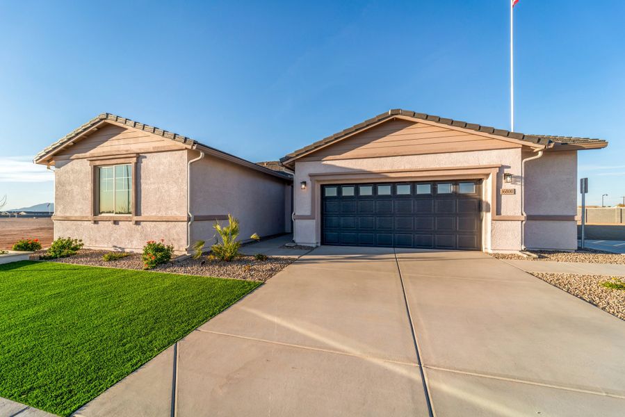 Front exterior of a home in the Rancho Mirage community, located in Maricopa, AZ (Image 4). Front exterior of a home in the Rancho Mirage community, located in Maricopa, AZ (Image 4).