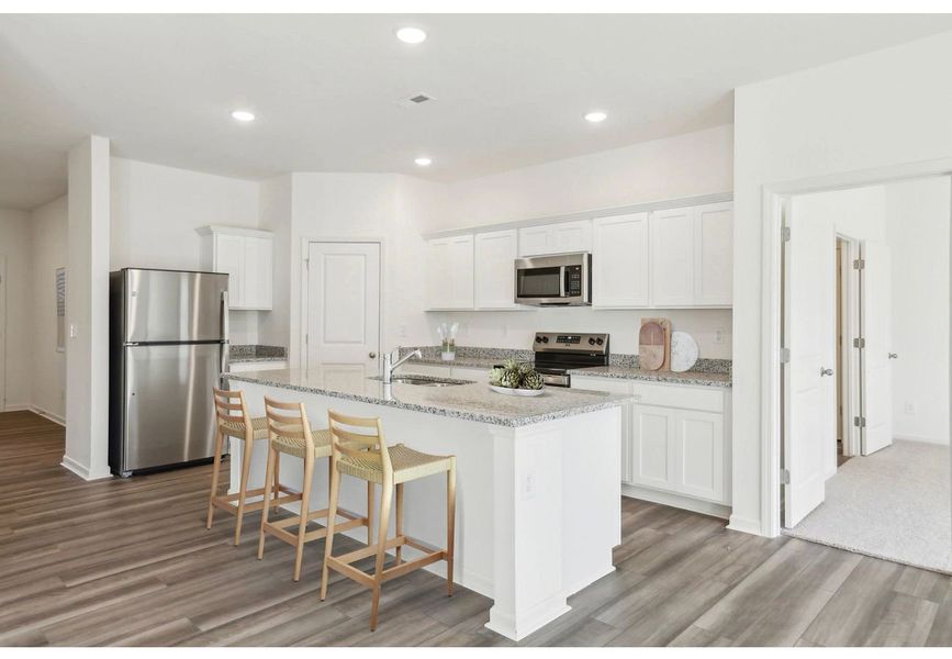 Furnished interior in a model home at Glen Abbey in Kernersville (Image 3).