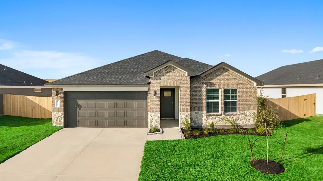 Front exterior of a home in the Caldwell Crossing community, located in Iowa Colony, TX (Image 10).