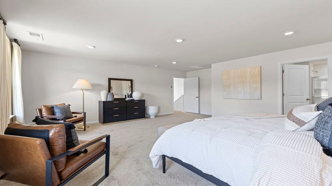 Furnished interior in a model home at Harrier Point in Woodruff (Image 25).