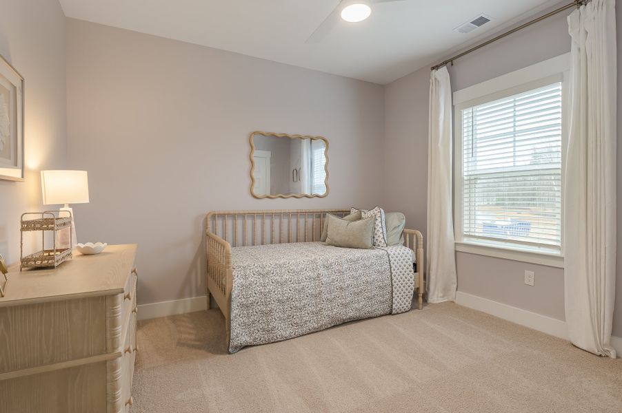 Furnished interior in a model home at Founder's Park in Summerville (Image 29).