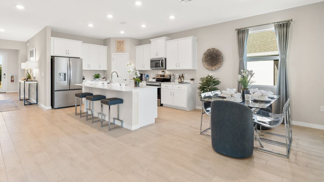 Furnished interior in a model home at Coral Lakes - Tradition & Express in Punta Gorda (Image 19).