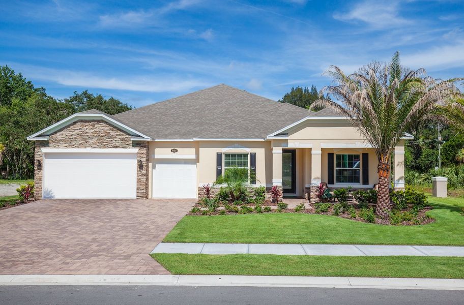 Front exterior of a home in the Graceland Estates community, located in Thonotosassa, FL (Image 2).