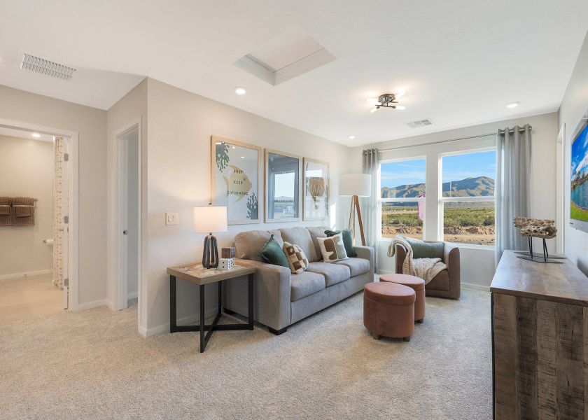 A living room with a large window.