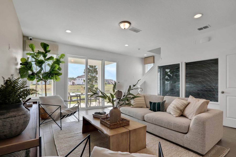 Furnished interior in a model home at Brandon Lakes at Silver Landing in St. Augustine (Image 31).