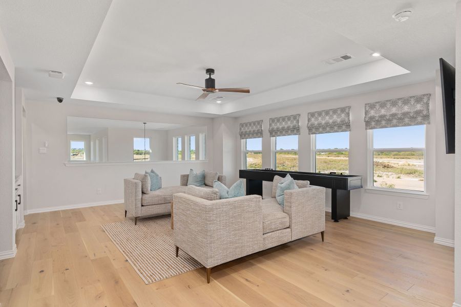 Furnished interior in a model home at Sweetgrass 50s in Haslet (Image 29).
