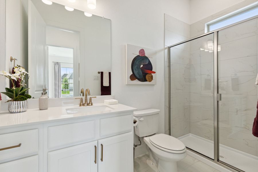 Furnished interior in a model home at Painted Tree Lakeside in McKinney (Image 49).