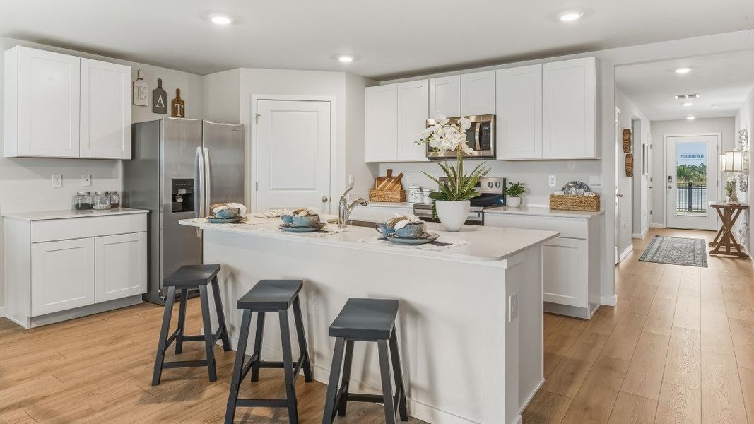 Furnished interior in a model home at Coral Lakes - Tradition & Express in Punta Gorda (Image 40).