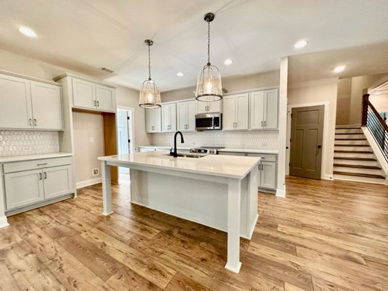 Furnished interior in a model home at Triple Park in Moreland (Image 4).