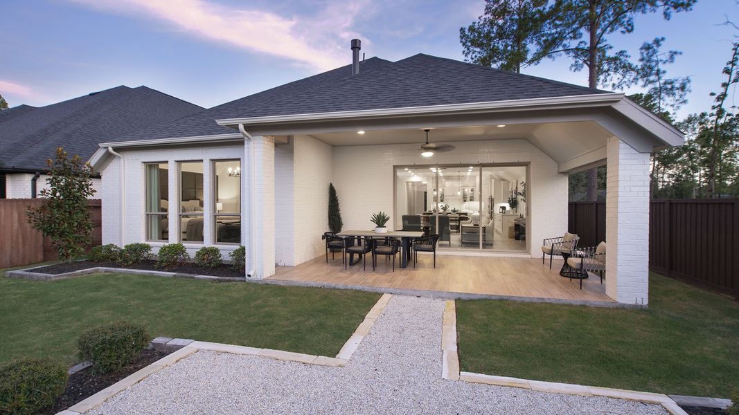 Front exterior of a home in the Woodhavyn 50' community, located in Magnolia, TX (Image 8). Front exterior of a home in the Woodhavyn 50' community, located in Magnolia, TX (Image 8).