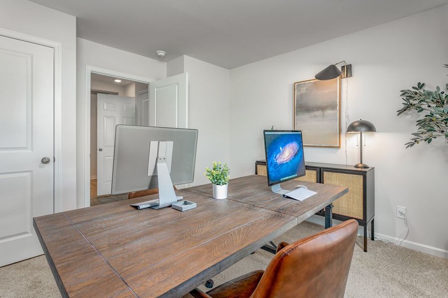 Furnished interior in a model home at River's Edge in Mayodan (Image 32).