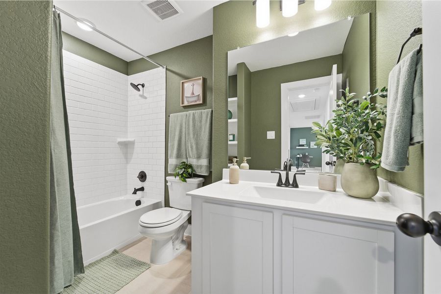 Furnished interior in a model home at Infinity Square in Kyle (Image 31).