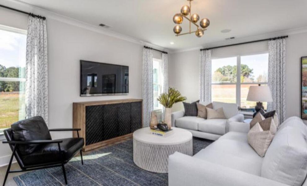 Furnished interior in a model home at Black Forest Pointe in Benson (Image 13).