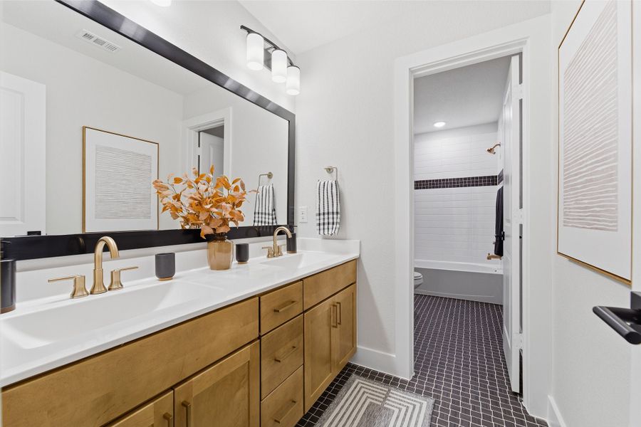 Furnished interior in a model home at Lariat in Liberty Hill (Image 46).