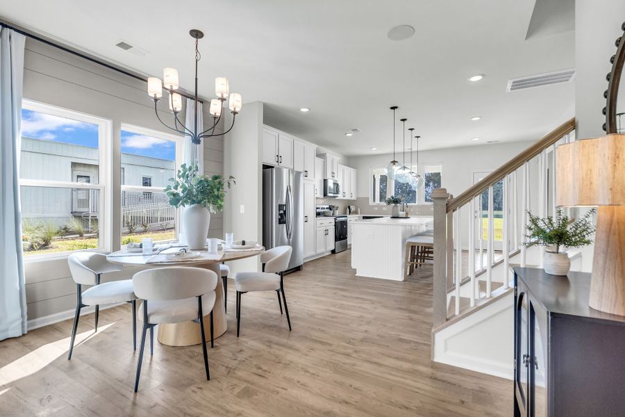 Furnished interior in a model home at Reeves Crossing in St. George (Image 7).