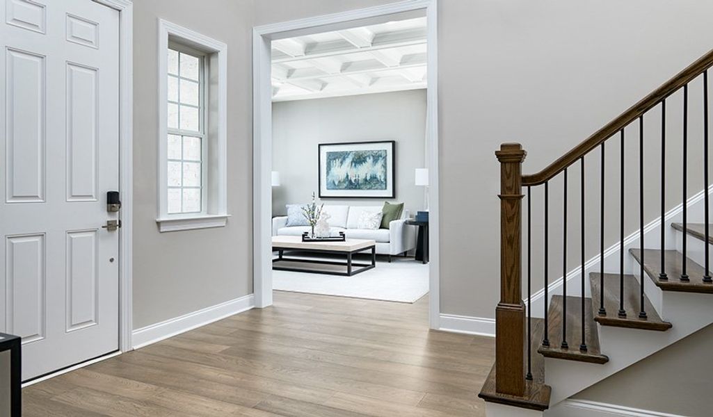 Furnished interior in a model home at August Park in Spring Hill (Image 8).