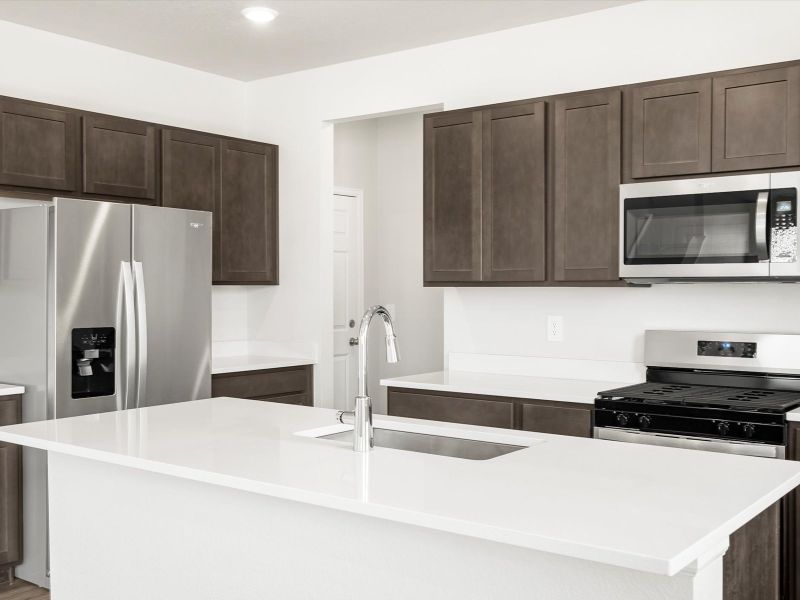 Furnished interior in a model home at Frontier Estates - The Flora Collection in Firestone (Image 13).