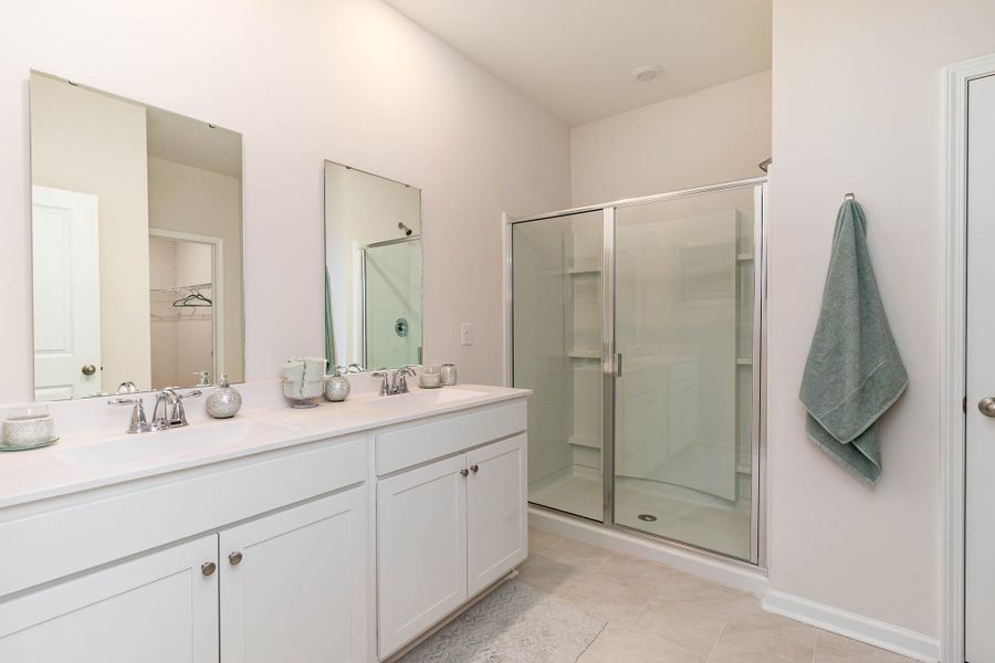 Furnished interior in a model home at Island Green in Myrtle Beach (Image 66).