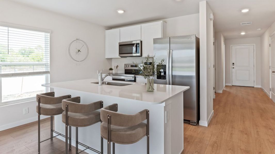 Furnished interior in a model home at Asher Park in Lehigh Acres (Image 45).
