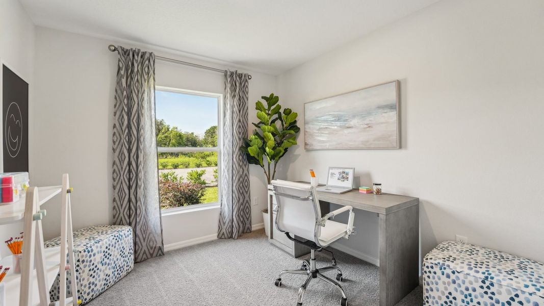 Furnished interior in a model home at Sunset Hills in Summerfield (Image 25).