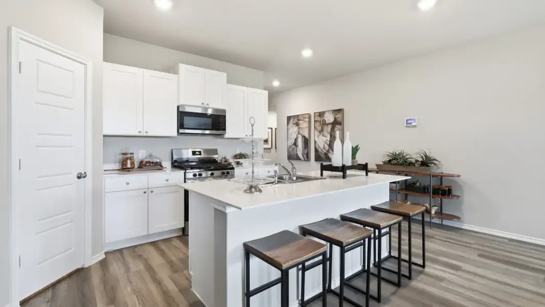 Furnished interior in a model home at Hadley Farms in Godley (Image 3).