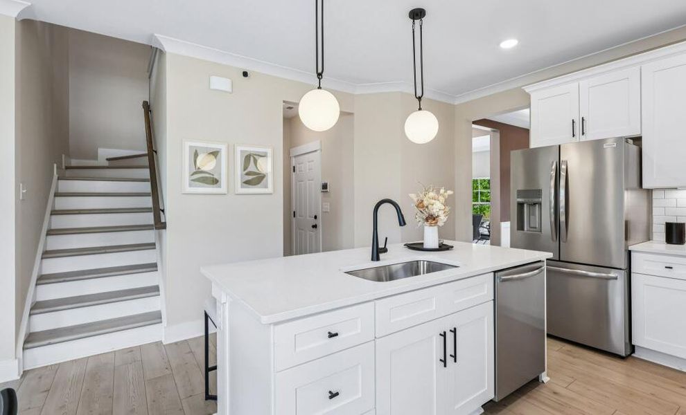 Furnished interior in a model home at Bellevue Townhomes in Greenville (Image 10).