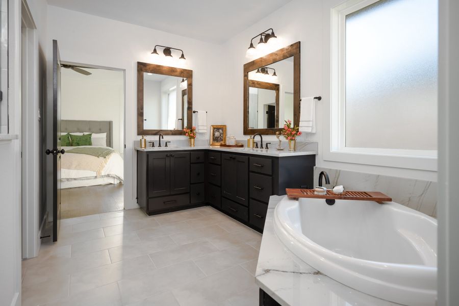 Furnished interior in a model home at Greens Prairie Reserve in College Station (Image 22).