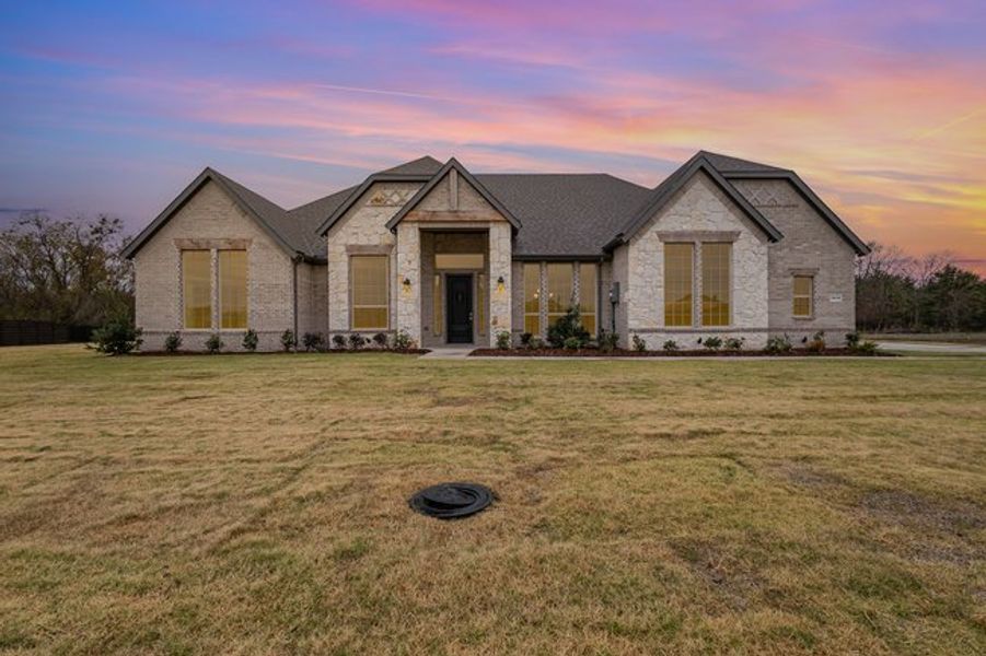 Front exterior of a home in the Emerson Farms community, located in Rockwall, TX (Image 5).