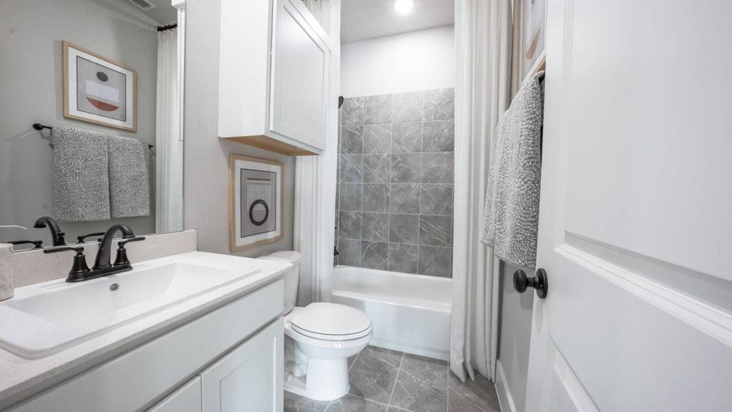 Furnished interior in a model home at The Meadows in Denton (Image 28).