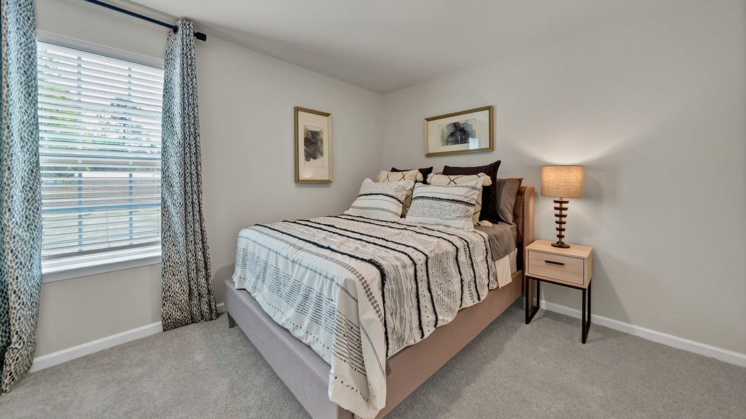 Furnished interior in a model home at South Haven in Camden (Image 19).