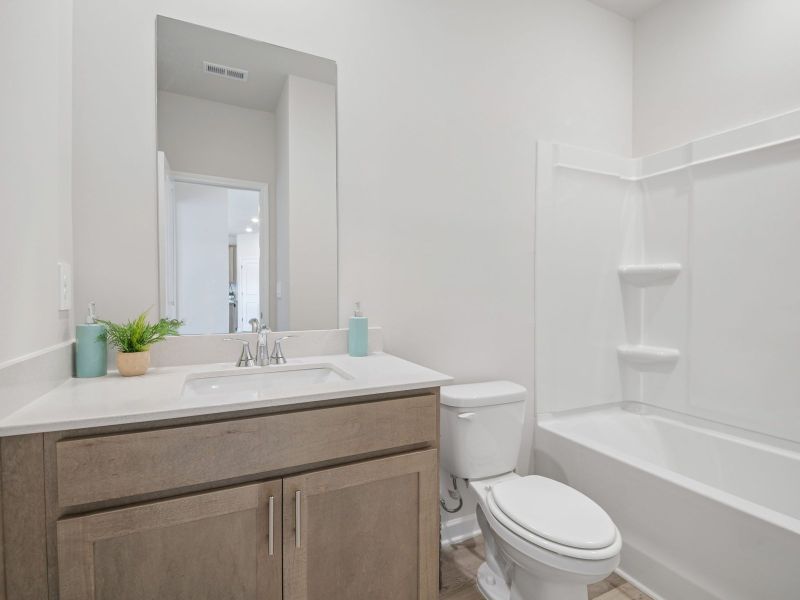 Furnished interior in a model home at Moss Farms in Lula (Image 11). Furnished interior in a model home at Moss Farms in Lula (Image 11).