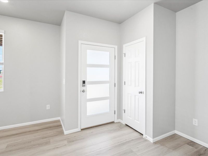 Entry of the Woodland floorplan at a Meritage Homes community in Broomfield, CO.